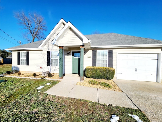 ranch-style home with a garage