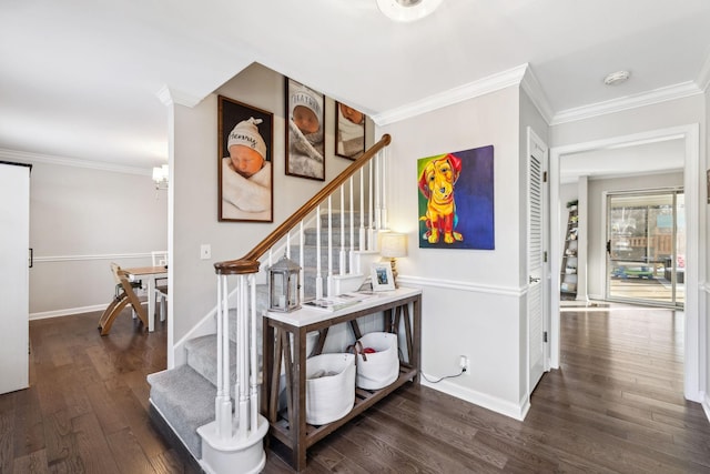 stairs with a notable chandelier, ornamental molding, and hardwood / wood-style flooring