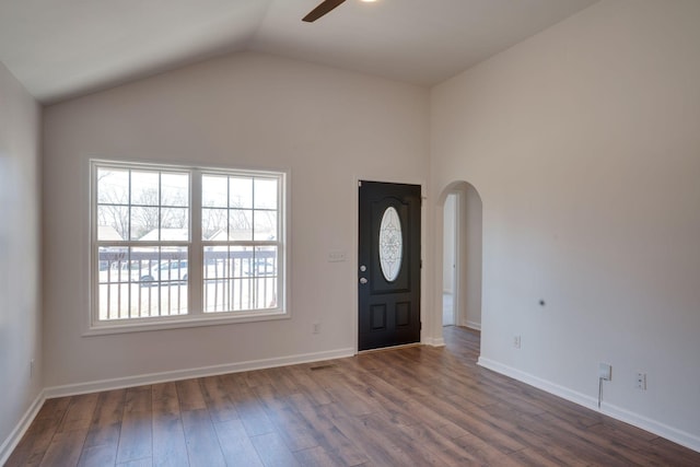 entryway featuring ceiling fan, dark hardwood / wood-style floors, and vaulted ceiling