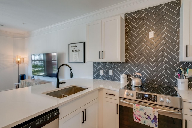 kitchen featuring stainless steel appliances, decorative backsplash, crown molding, white cabinets, and sink