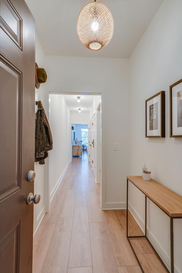 hallway featuring light hardwood / wood-style flooring