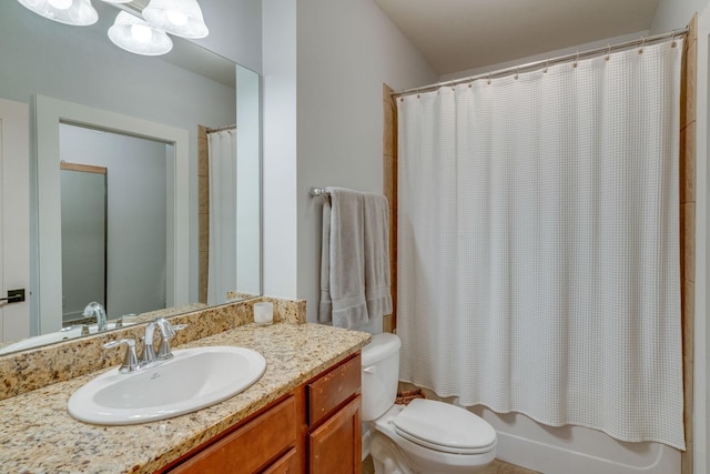 full bathroom featuring toilet, vanity, and shower / bathtub combination with curtain