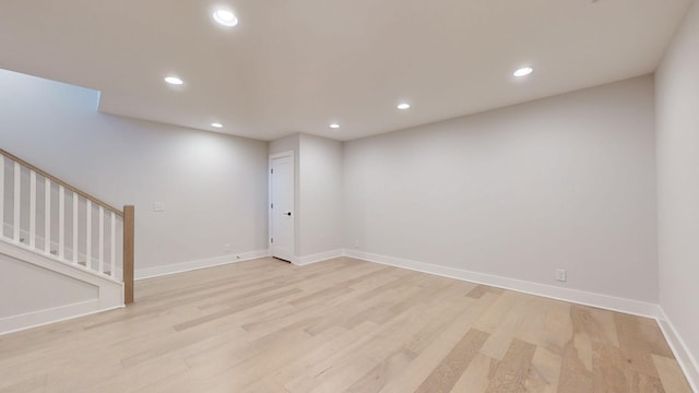 basement featuring light hardwood / wood-style floors