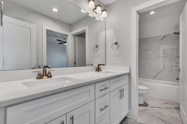 full bathroom with toilet, ceiling fan, bathing tub / shower combination, and vanity