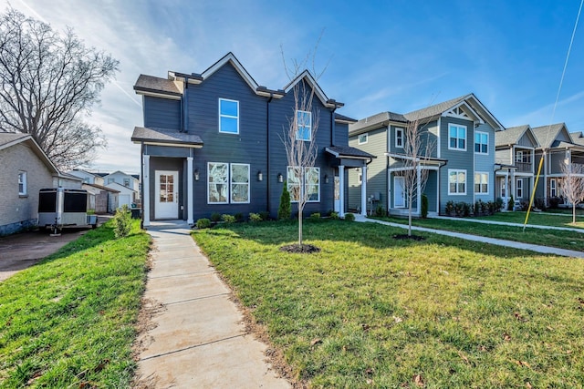 view of front of home featuring a front yard