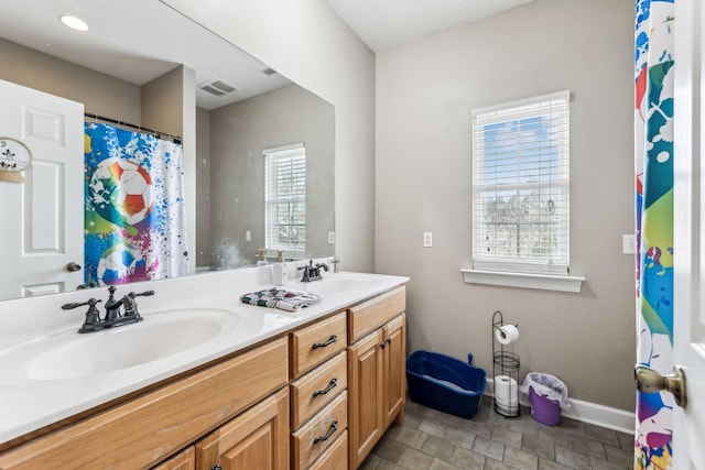 bathroom featuring vanity