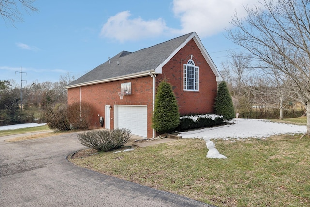 view of property exterior featuring a yard and a garage