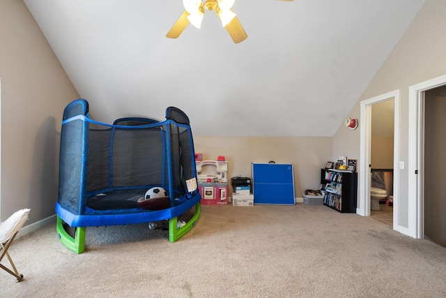 rec room featuring ceiling fan, carpet, and lofted ceiling