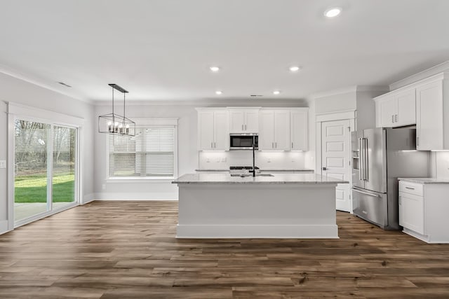 kitchen with white cabinetry, light stone countertops, an island with sink, and appliances with stainless steel finishes