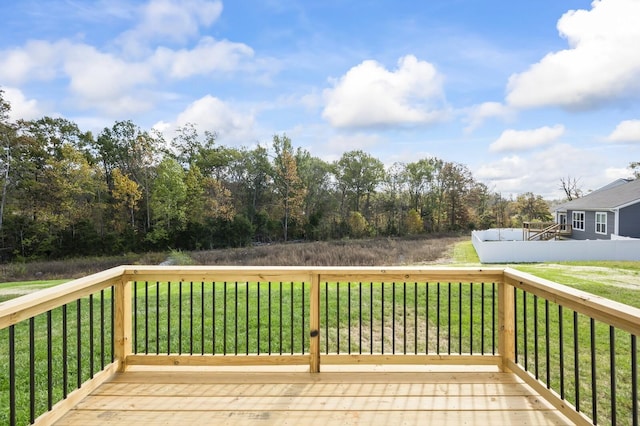 deck featuring a yard