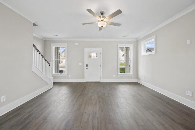 entrance foyer with ceiling fan, dark wood-type flooring, and crown molding