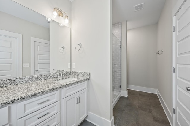 bathroom with vanity and walk in shower