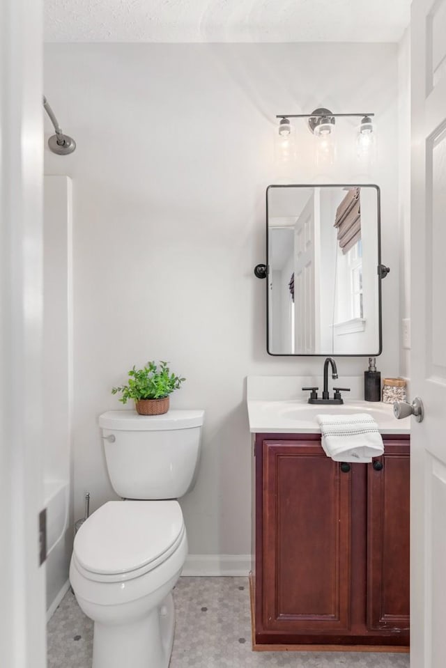 full bathroom with toilet, shower / bathtub combination, and vanity