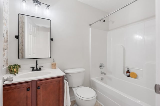 full bathroom featuring toilet, vanity, and bathing tub / shower combination