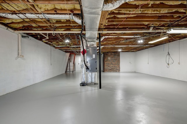 basement featuring heating unit