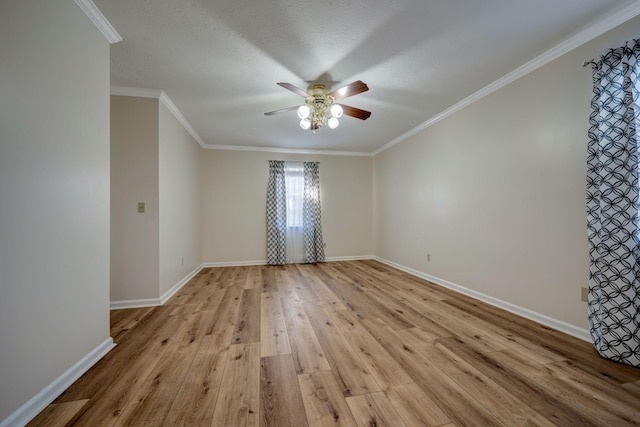 unfurnished room featuring ceiling fan, a textured ceiling, crown molding, and light wood-type flooring