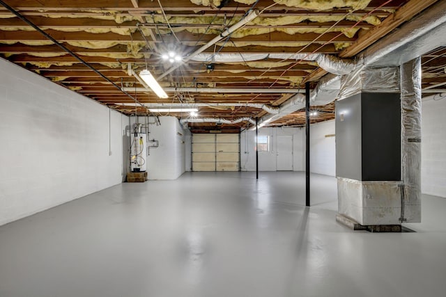 basement featuring gas water heater