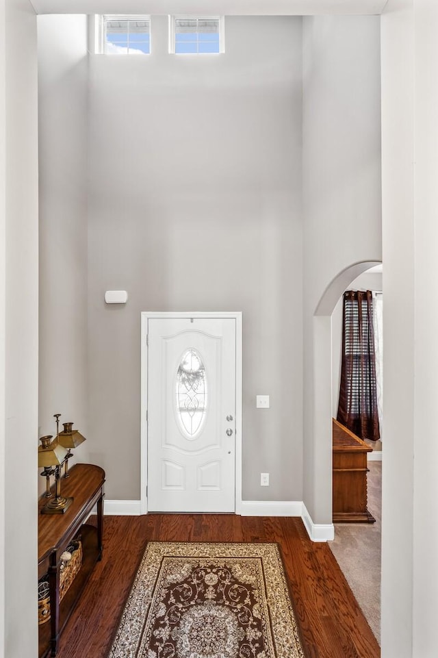 foyer entrance featuring dark hardwood / wood-style flooring