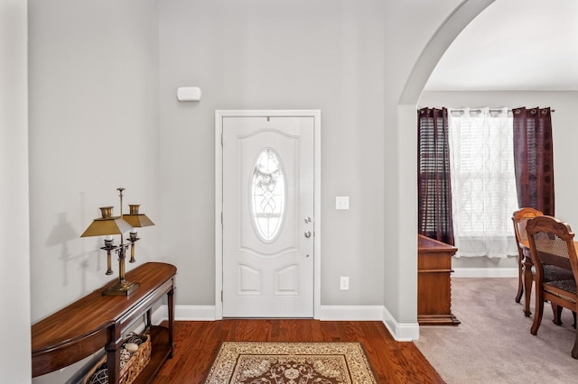 entryway with a healthy amount of sunlight and wood-type flooring