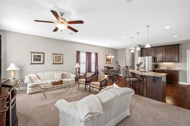 living room with ceiling fan