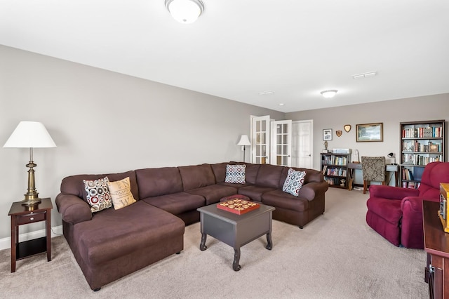 living room with light carpet