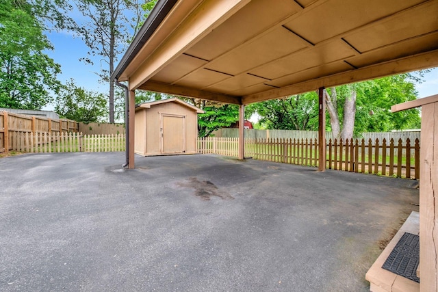 view of patio / terrace featuring a storage unit