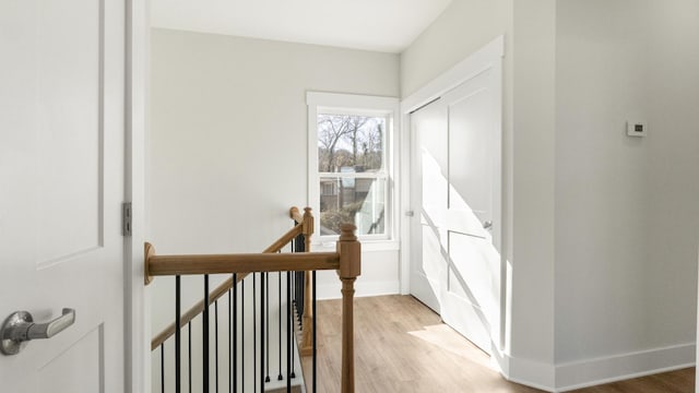 hall with light wood-type flooring