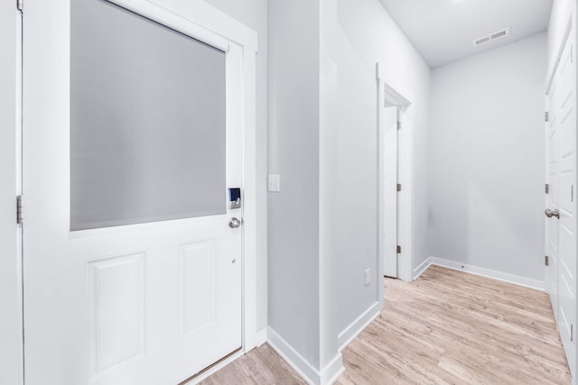 foyer entrance featuring light hardwood / wood-style floors