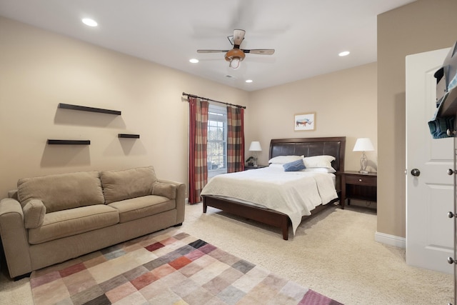 carpeted bedroom with ceiling fan