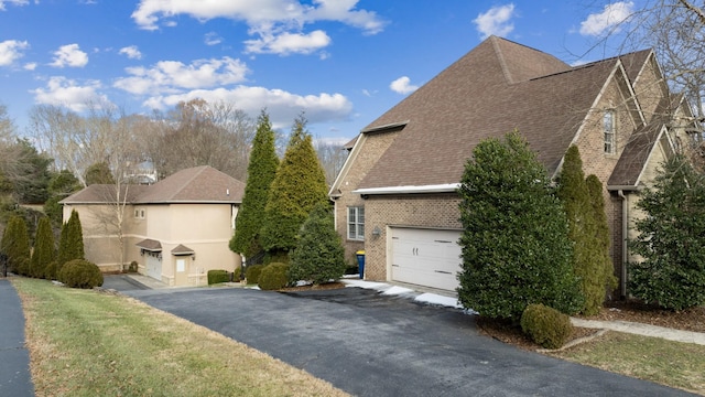 view of property exterior featuring a garage