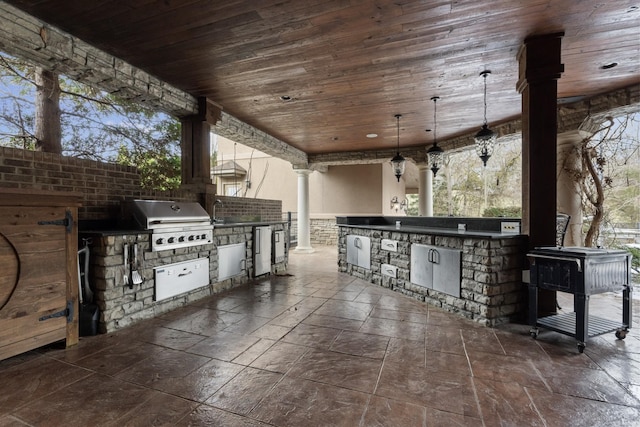 view of patio / terrace with sink and area for grilling