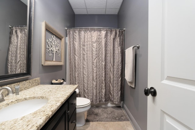 bathroom with toilet, vanity, and walk in shower