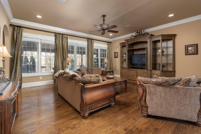 living room with ceiling fan, wood-type flooring, and ornamental molding