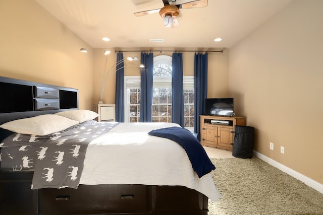 bedroom with ceiling fan and carpet