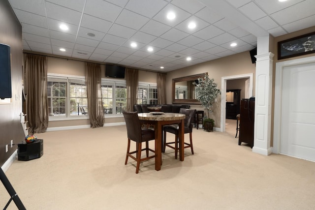 view of carpeted dining area