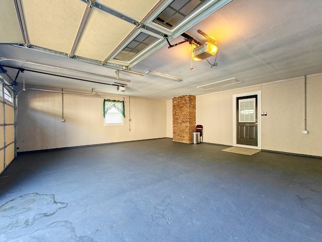 garage featuring a garage door opener