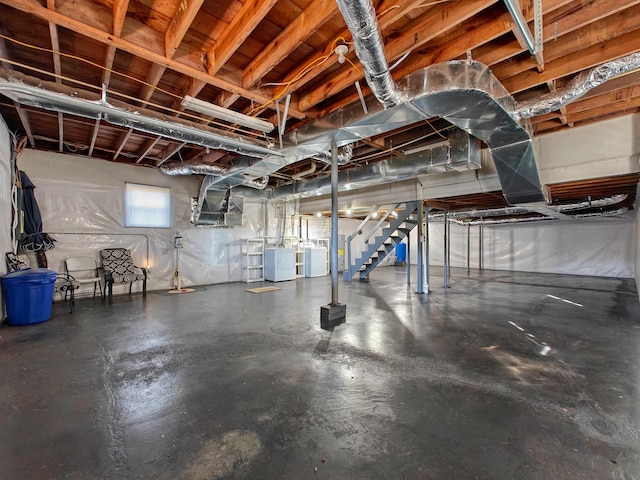 basement featuring washer and clothes dryer