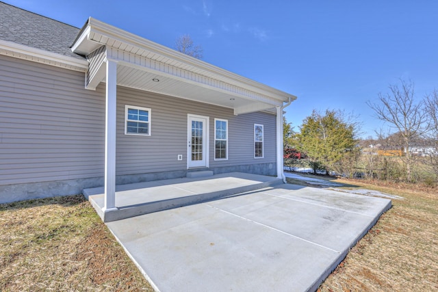 rear view of house with a patio area