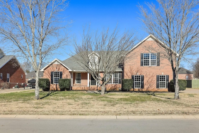 view of front facade featuring a front lawn