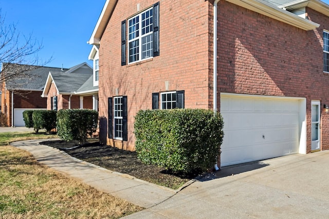 view of home's exterior with a garage