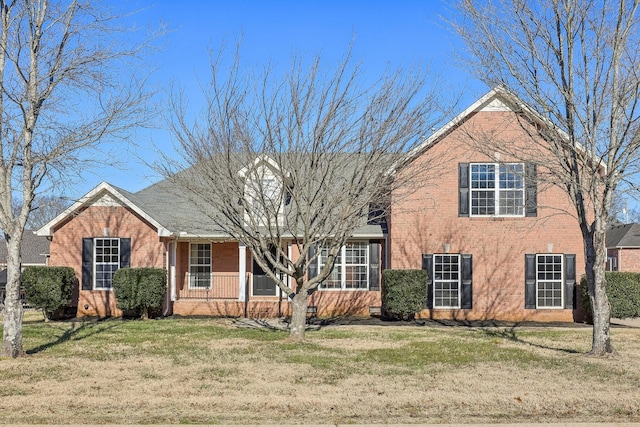 view of front of property with a front lawn