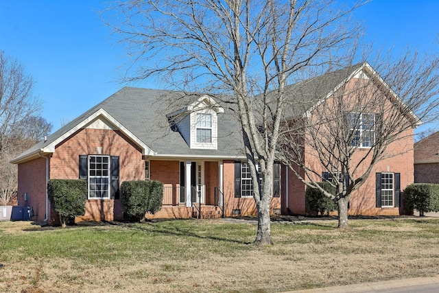 view of front of home with a front lawn and a porch