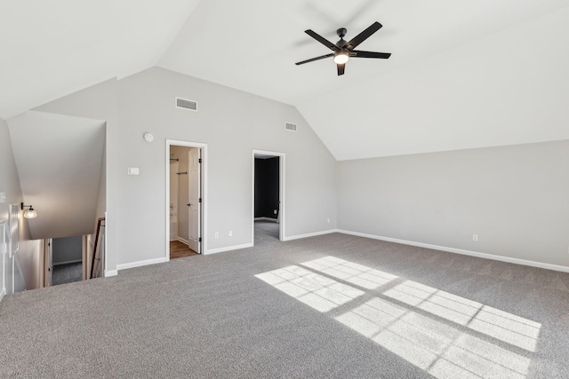 additional living space with ceiling fan, vaulted ceiling, and carpet