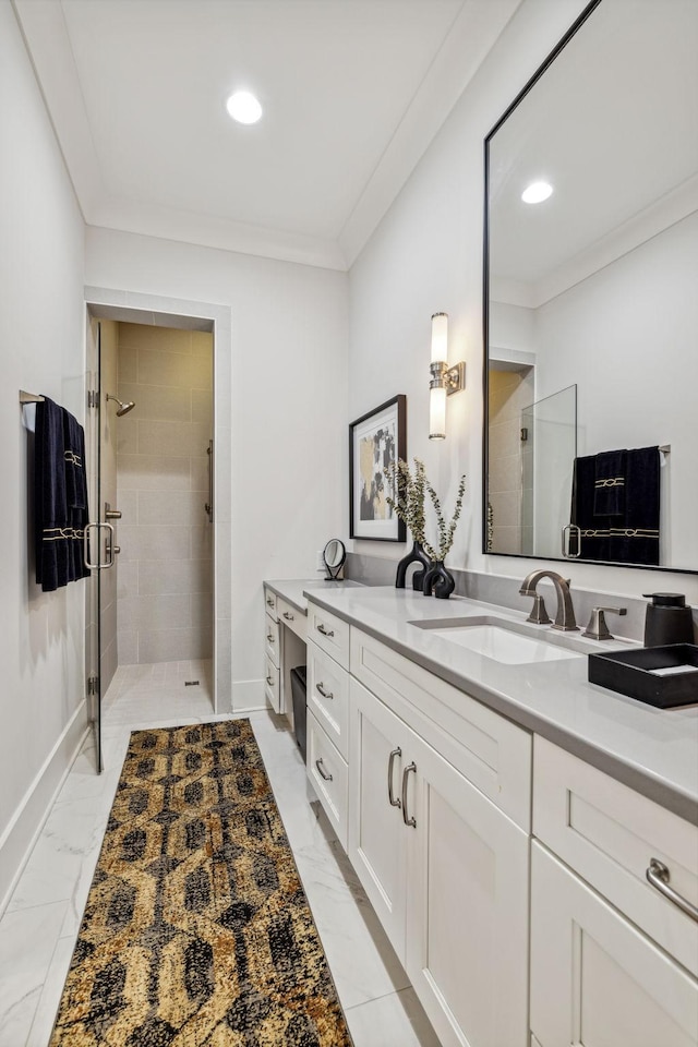 bathroom featuring vanity, crown molding, and walk in shower