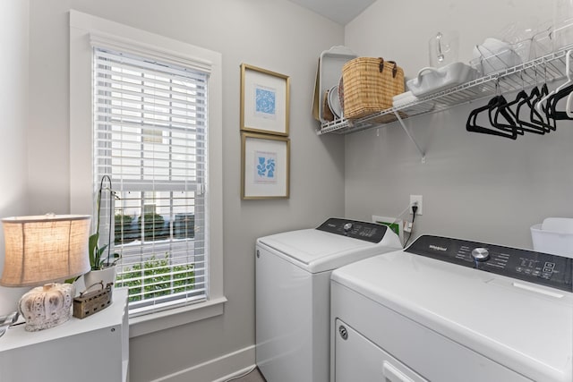 laundry room with washing machine and dryer