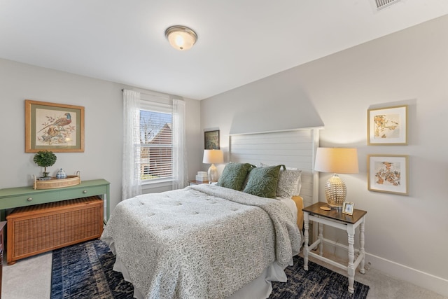 bedroom featuring carpet