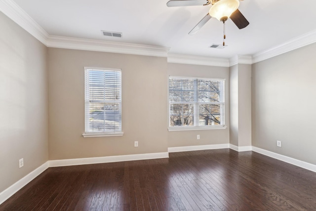 spare room with ceiling fan, dark hardwood / wood-style floors, and ornamental molding