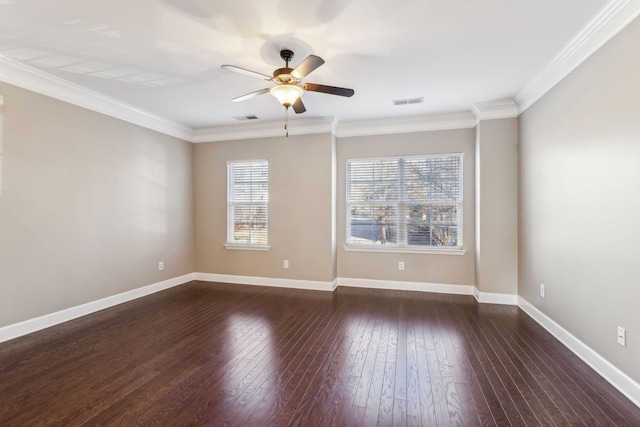 empty room with ceiling fan, dark hardwood / wood-style floors, and ornamental molding