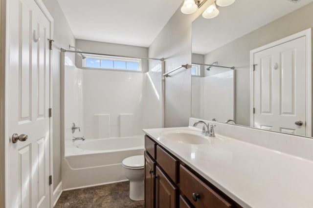 full bathroom with washtub / shower combination, vanity, and toilet