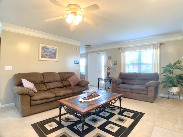 living room with ceiling fan, light carpet, and crown molding